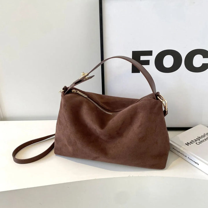 Tijdloze retro schoudertas voor dames, zowel bruin als zwart, een elegant en veelzijdig accessoire.