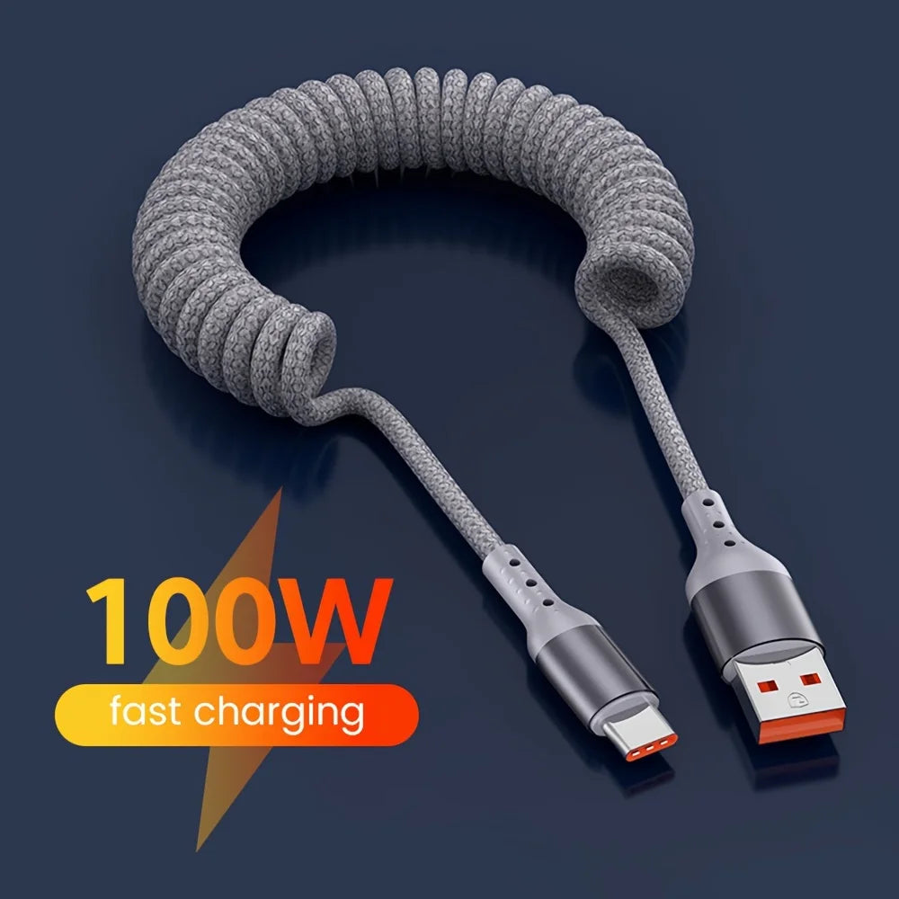 Praktische USB-C veerkabel 100W voor in de auto, houdt cockpit netjes en je telefoon snel opgeladen.