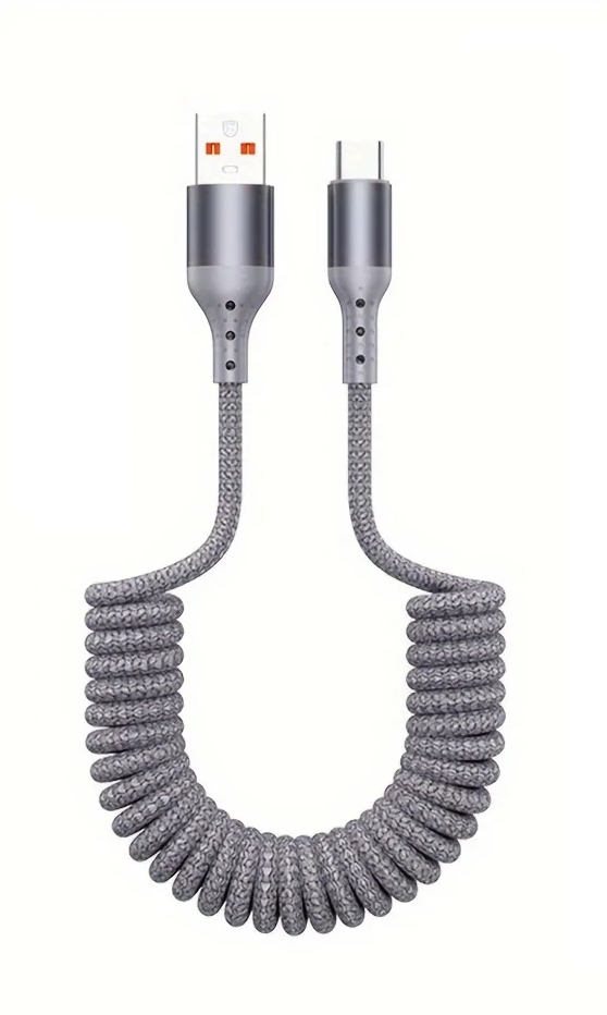Netjes opgerolde 100W USB-C veerkabel, gemakkelijk mee te nemen en compact op te bergen.