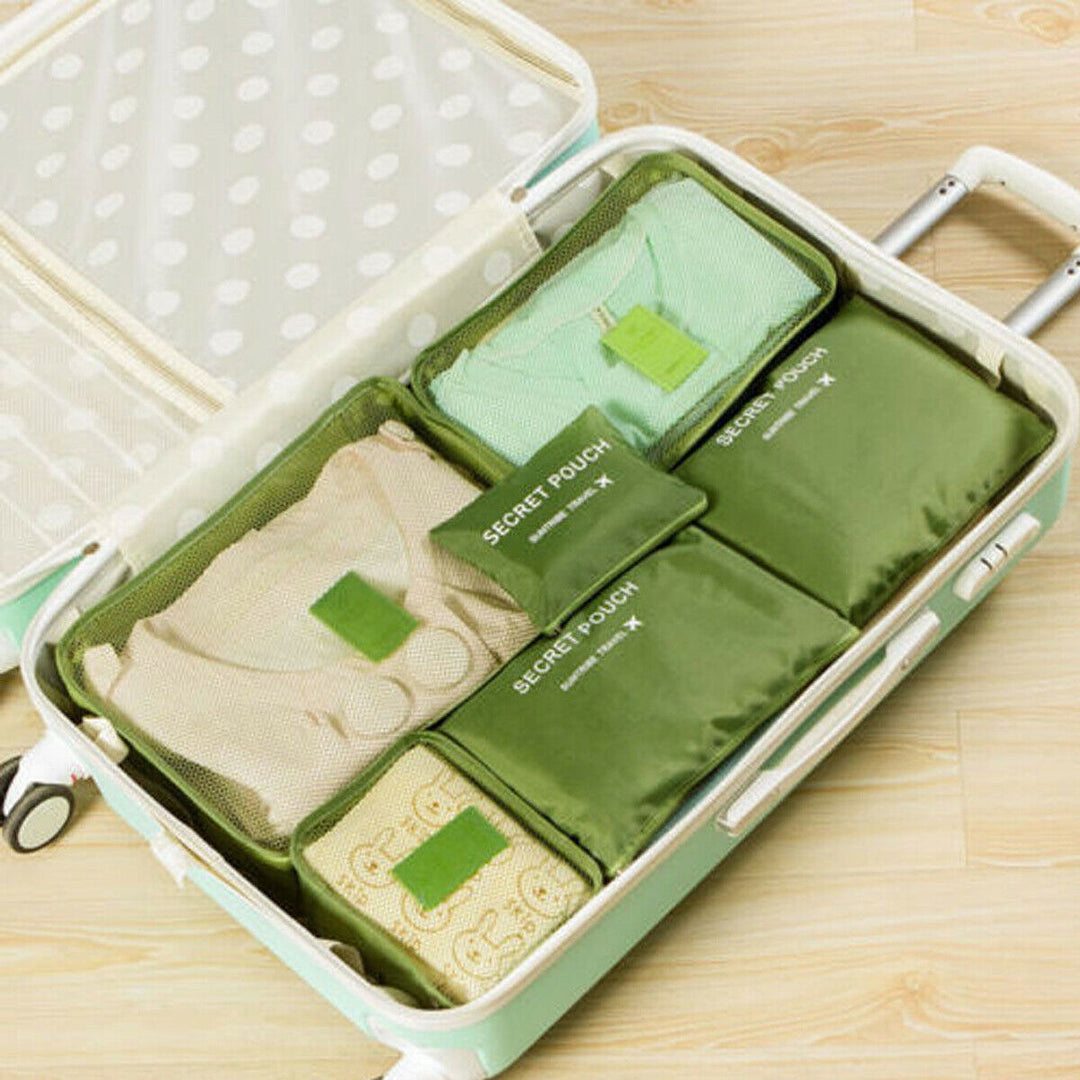 Set van diverse formaten inpakcubes en zakken voor optimale bagage indeling in je reistas.