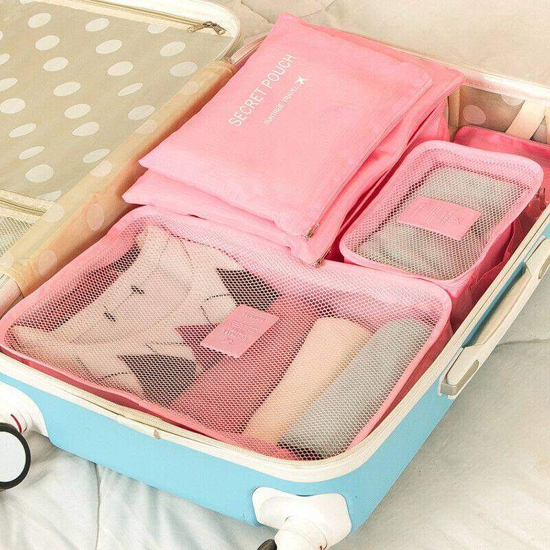 Complete 12-delige set bagage organizers voor een geordende reistas en stressvrij reizen.