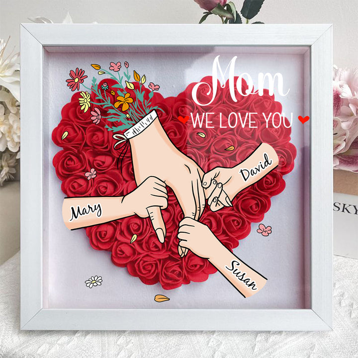 Gepersonaliseerde schaduwbox met familienamen, perfect als tijdloos Moederdag cadeau.