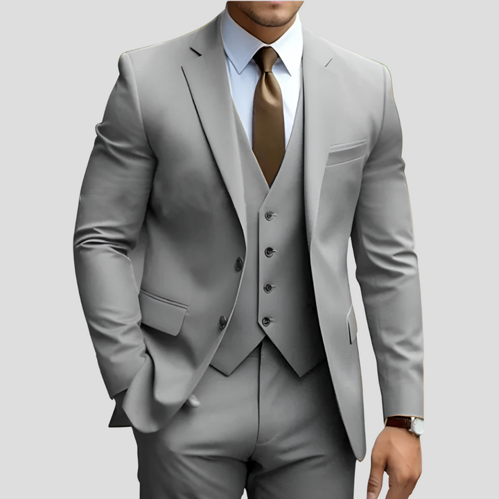 Tijdloos grijs slimfit herenpak, 3-delig. Veelzijdig en elegant voor zowel zakelijke als feestelijke gelegenheden.