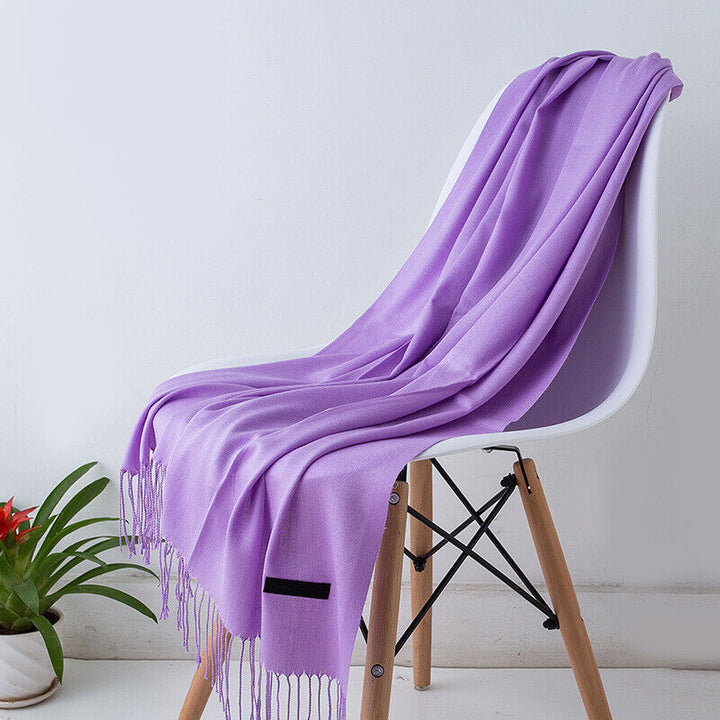 Lange dames sjaal Bria in trendy kleur, perfect als stijlvolle omslagdoek voor de winter.