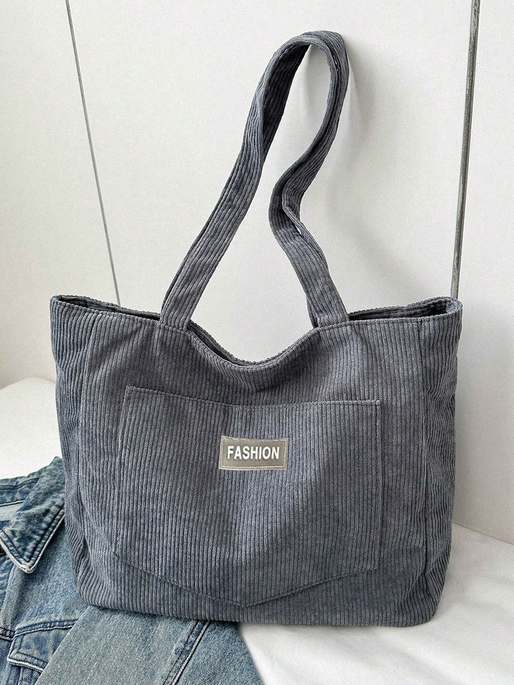 Ruime dames tas voor school en werk. Grote totebag die ook dient als comfortabele schoudertas.
