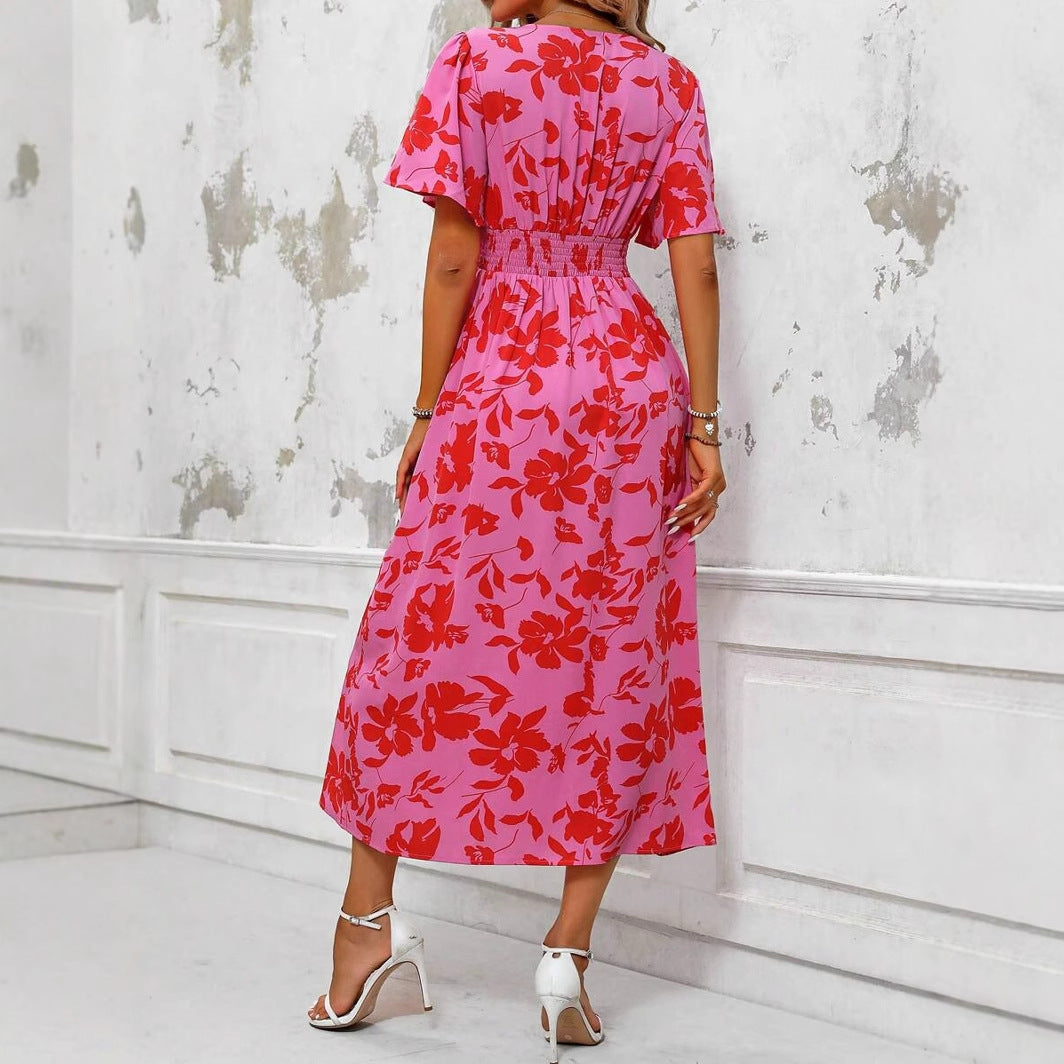 Roze dames midi bloemenjurk met split, ideaal als zomerjurk en feestelijke kleding