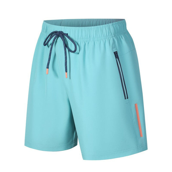 Lichtblauwe herensportshort met ritssluiting op witte achtergrond