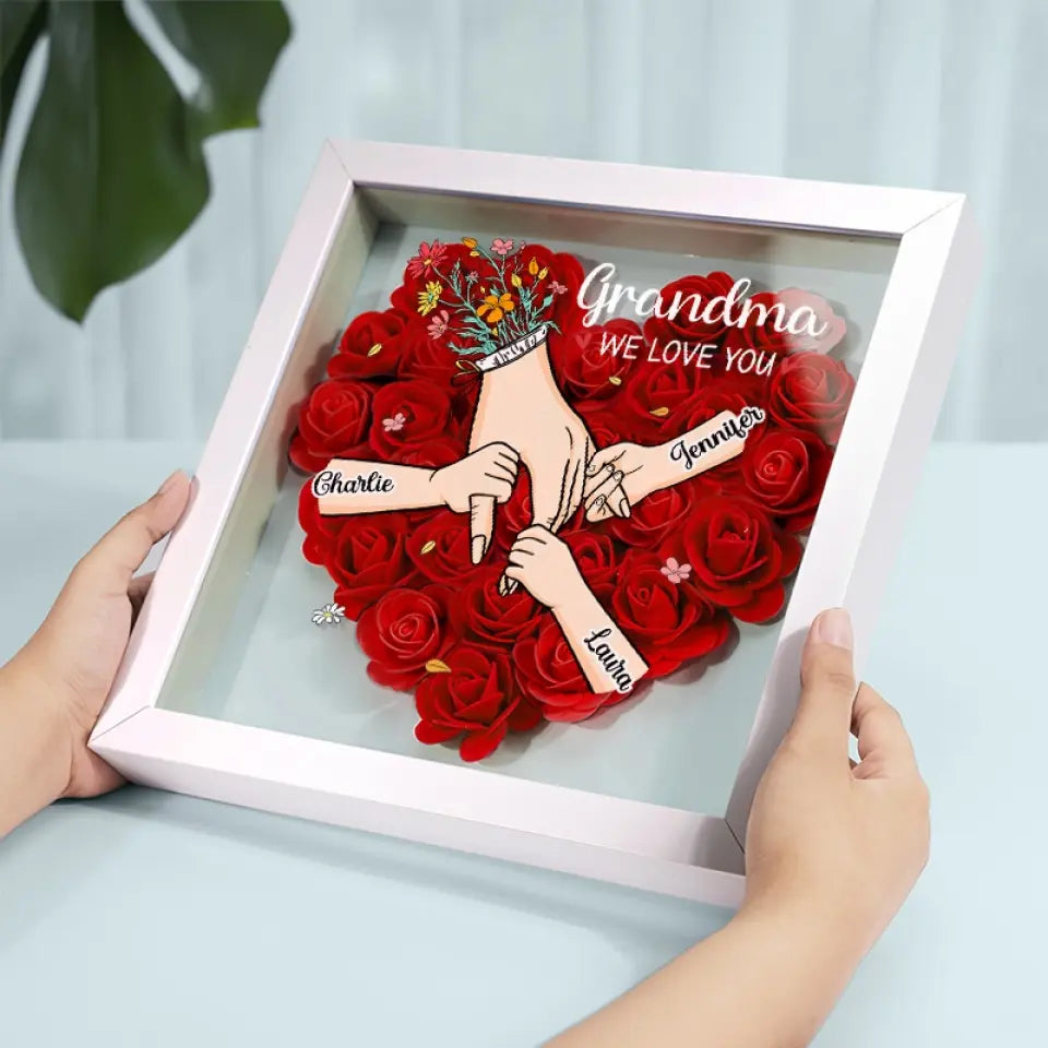 Gepersonaliseerde schaduwbox met namen, een blijvend symbool van familie, liefde en herinneringen.