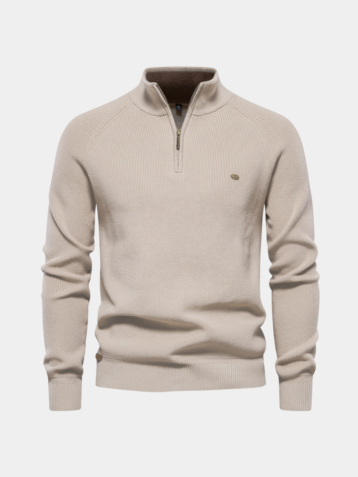 Blauwe luxe heren half zip trui, comfortabel en stijlvol. Essentiële herenmode voor koude dagen.
