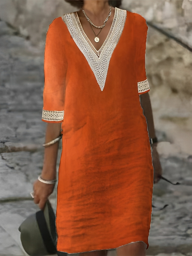 Comfortabele linnen dames zomerjurk in midi-lengte, perfect voor een luchtige stranddag of vakantie.