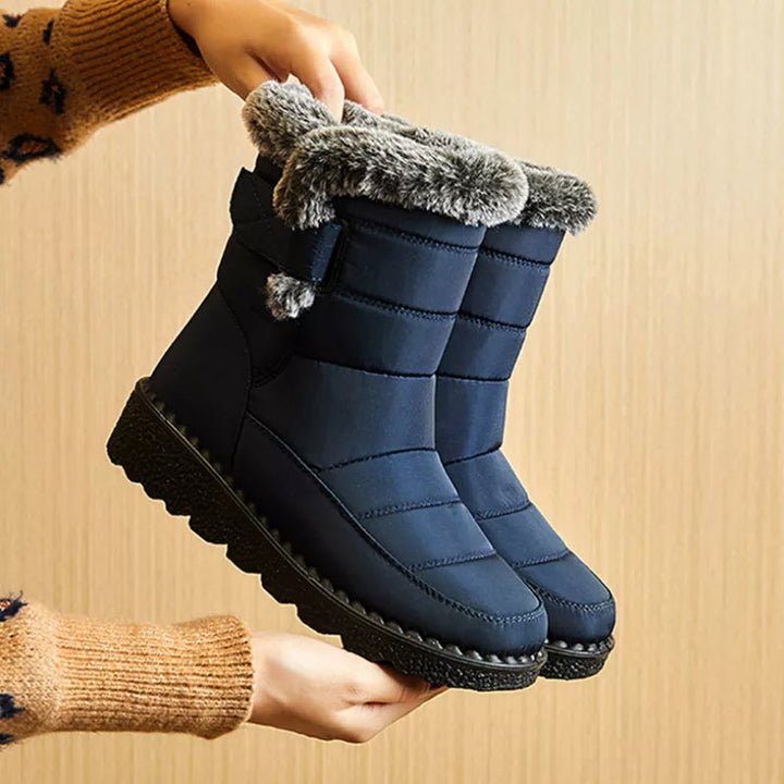 Klassieke zwarte unisex sneeuwlaarzen, met warme voering en stevige antislip grip voor de winter.