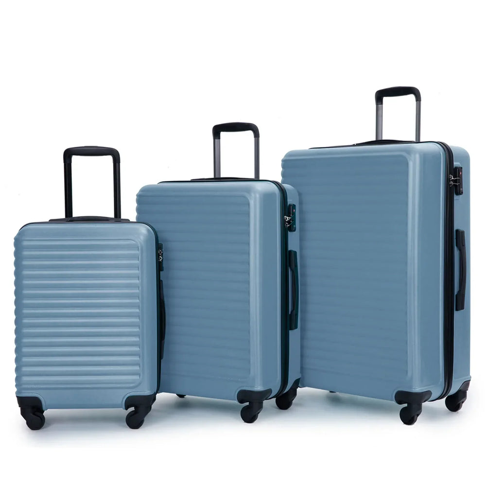 Blauwe ABS hardschaal reiskoffer set met stille spinnerwielen en stevig handvat, klaar voor je vakantie.