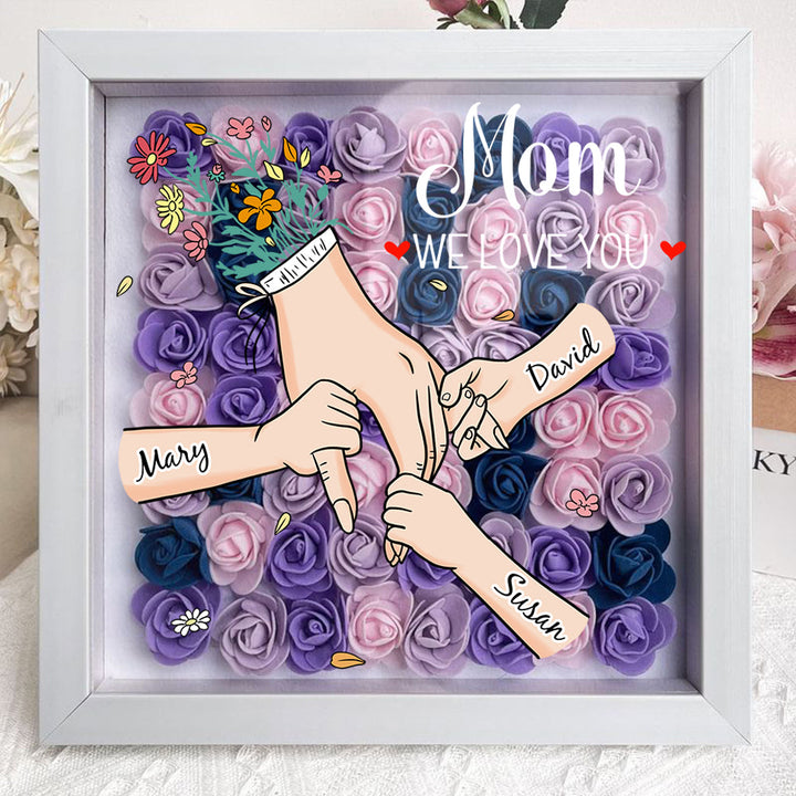 Decoratieve schaduwbox met namen, een gepersonaliseerd interieurstuk vol familie liefde voor mama.