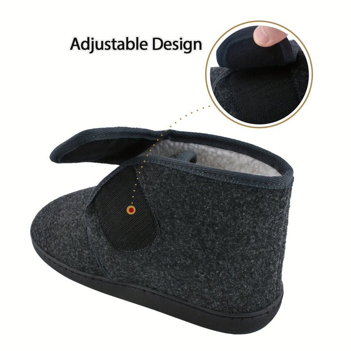 Zijaanzicht van een donkergrijze heren pantoffel met geopende klittenbandsluiting, details van de aanpasbare pasvorm.