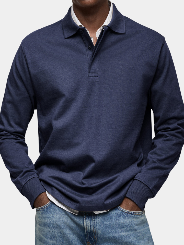 Donkerblauwe heren polo met lange mouwen en knoopsluiting