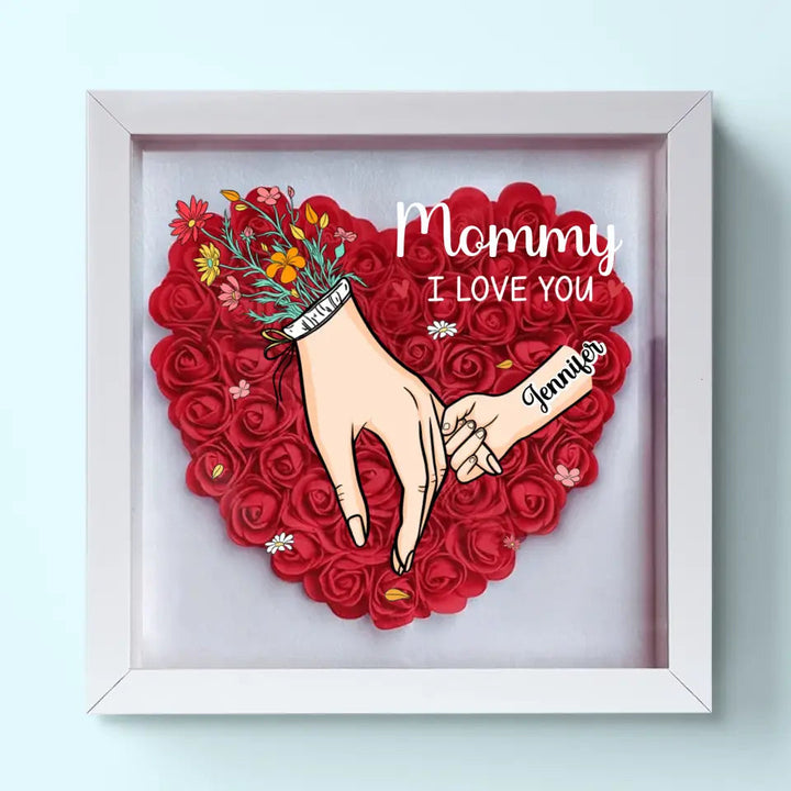 Interieur blikvanger: gepersonaliseerde schaduwbox met namen, een tijdloze en sfeervolle decoratie.