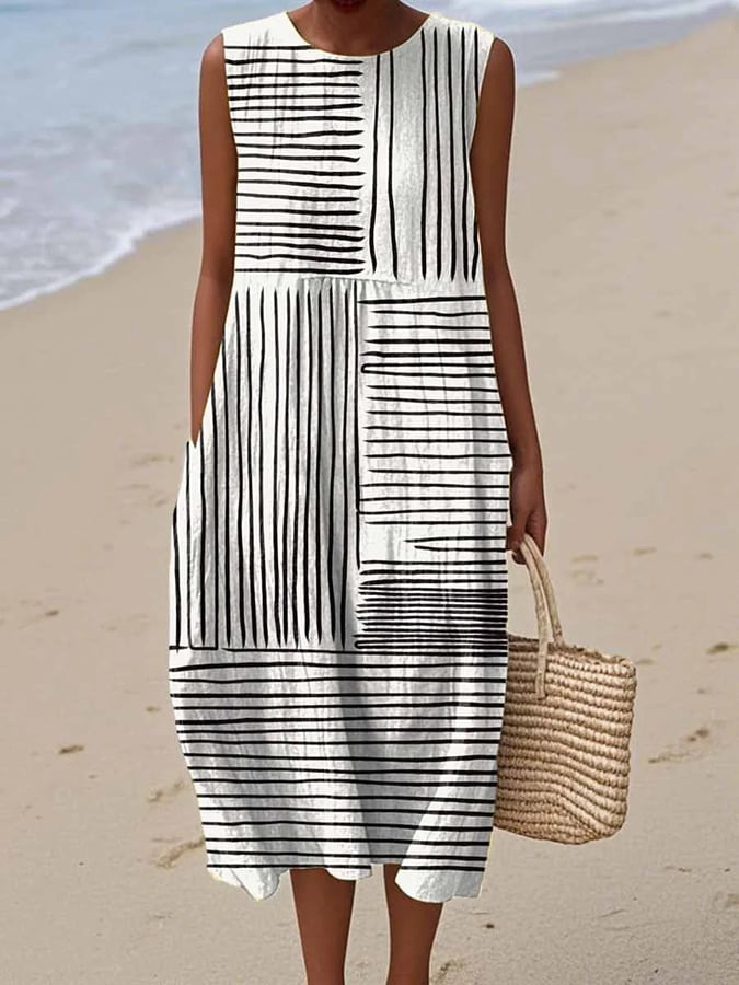 Vrouwelijke katoen linnen midi jurk met elegante print, perfect als comfortabele zomer- of casual jurk.
