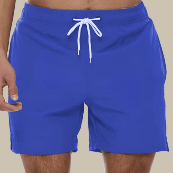 Zomerse heren zwemshorts, comfortabel en sneldrogend, essentieel voor vakantie.