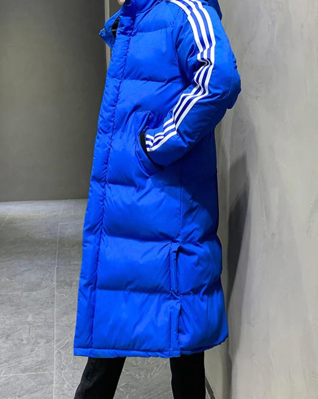 Trendy lange heren winterjas met capuchon, een stijlvolle en warme aanvulling op winterkleding. Perfect voor herenjas.