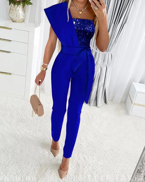 Feestelijke en chique dames jumpsuit met een flatterend silhouet en sprankelende pailletten voor gala's.