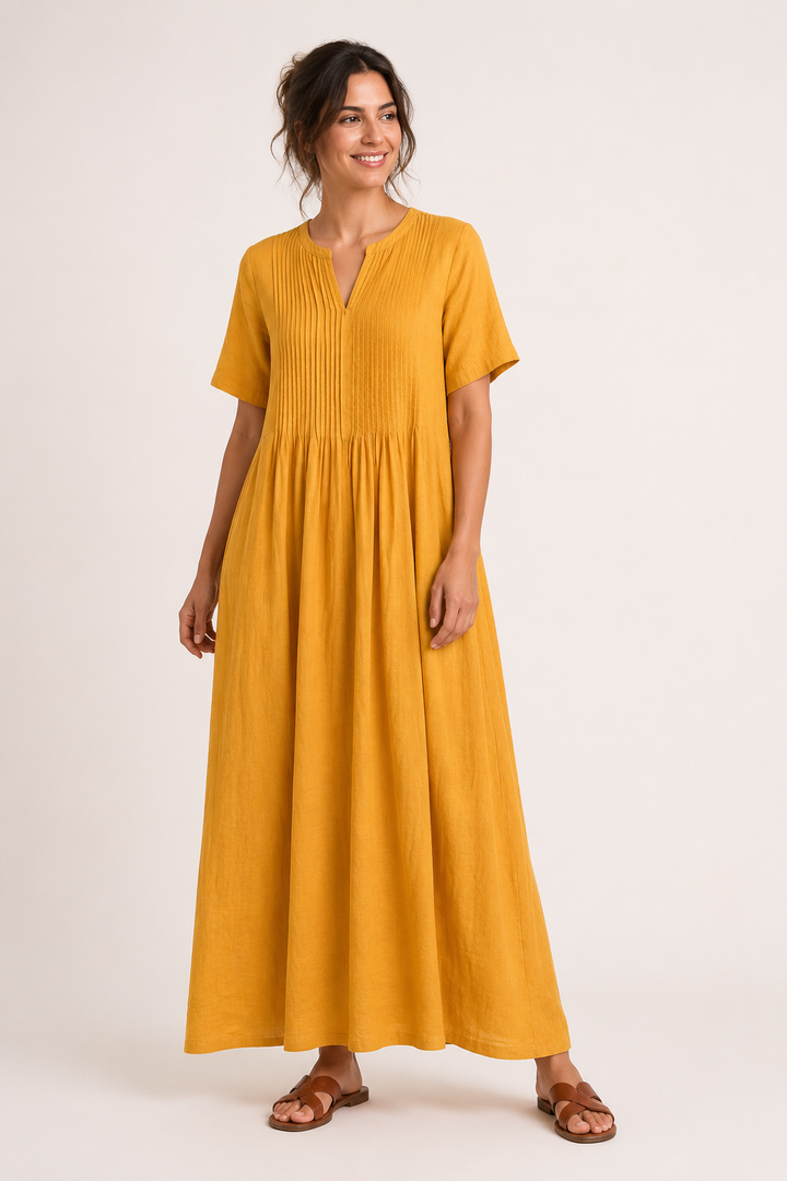 Lange dames maxi-jurk met V-hals en comfortabele zakken in trendy kleur