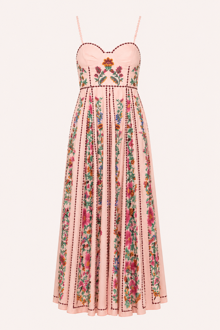 Mouwloze, comfortabele midi jurk voor dames, met chique bloemenprint en fijne bandjes. Perfect voor de zomer.