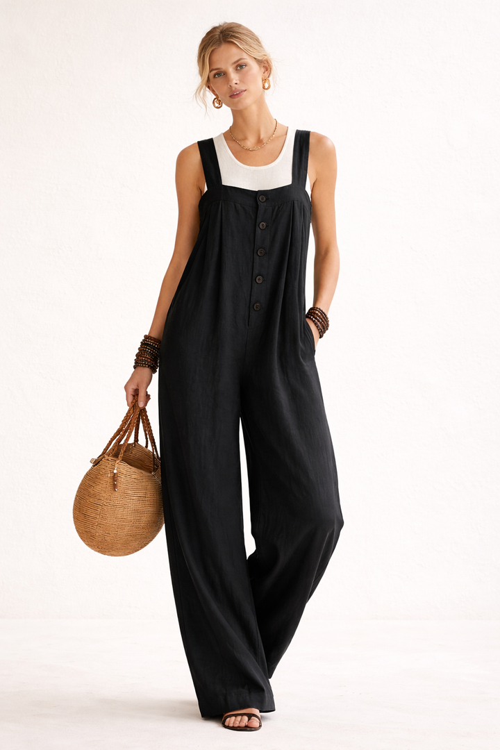 Stijlvolle lange jumpsuit voor dames met wijde broekspijpen en sierlijke knopen aan de voorkant.