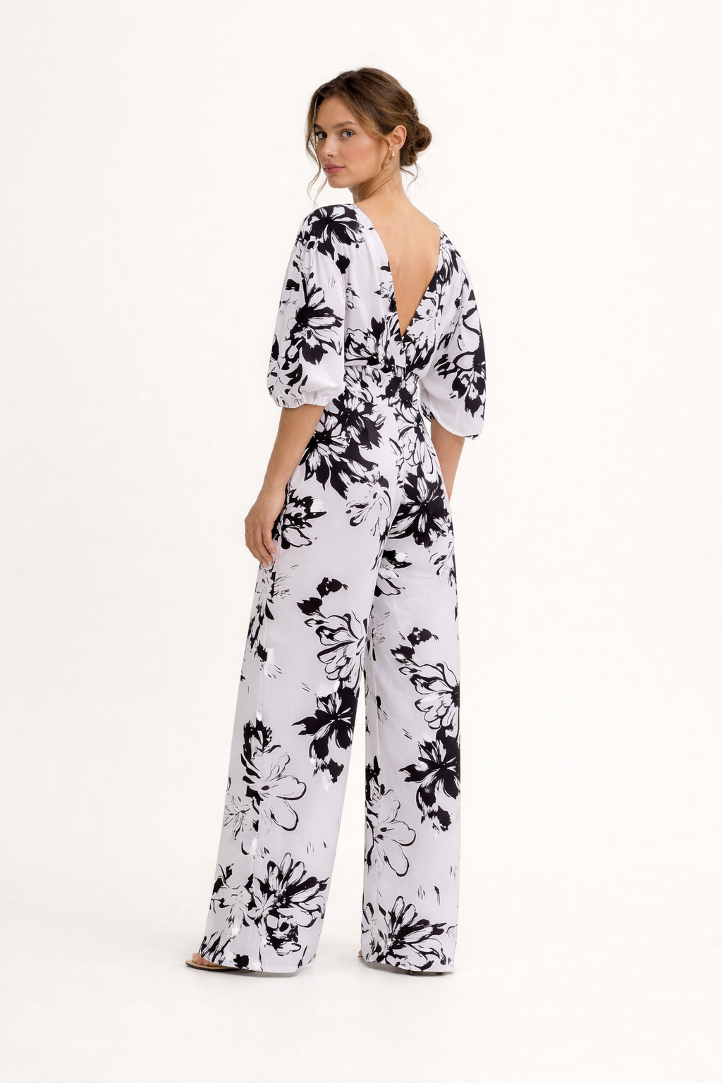 Dames jumpsuit met bloemenprint en hoge taille in wit achteraanzicht