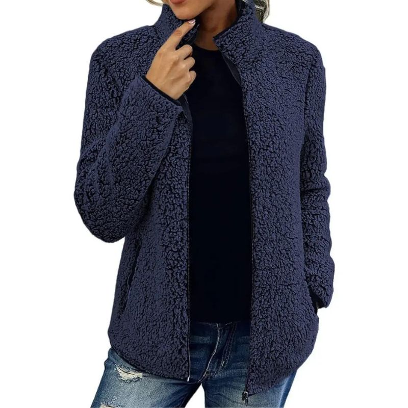 Comfortabele warme dameskleding: beige teddyjas met opstaande kraag en rits