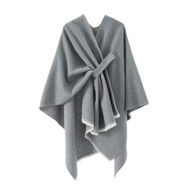 Comfortabele loose fit damesponcho van kasjmierlook, perfect als warm vest voor dameskleding. Retro stijl.