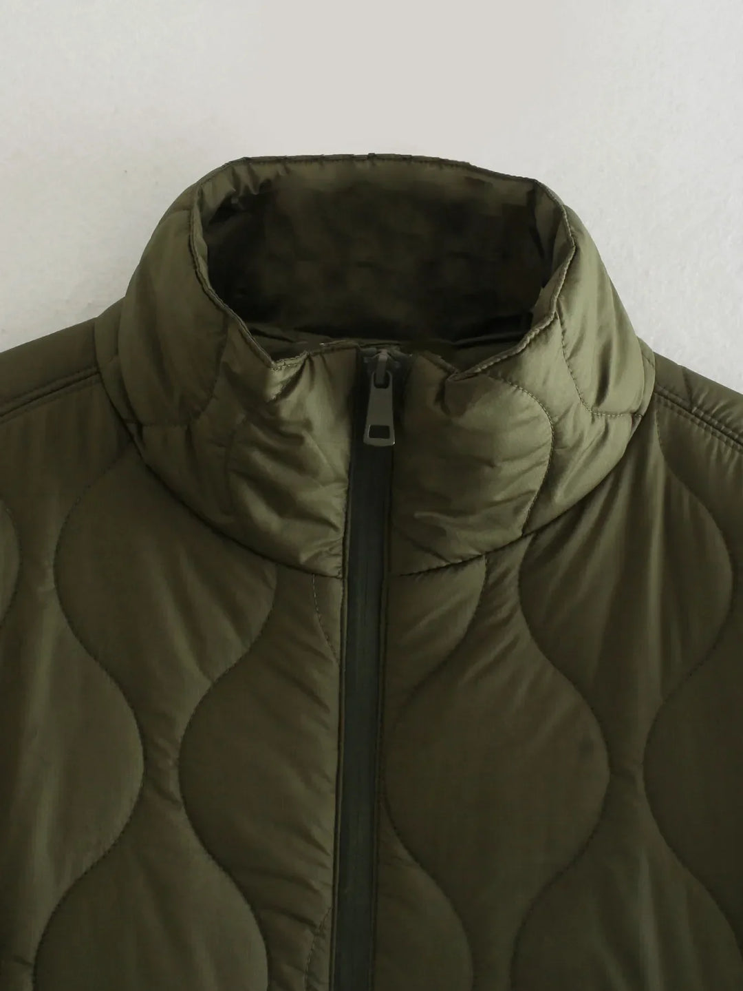 Kwaliteitslabel en hangtag van de casual bodywarmer