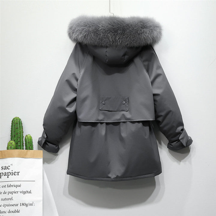 Verfijnde damesjas, warm en verstelbaar, de ideale winterjas voor elegante buitenkleding.