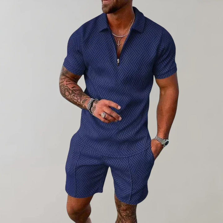 Stijlvolle heren zomerset: luchtige korte broek en blouse van Hoymans, perfect voor casual mode en ontspannen zomeravonden.