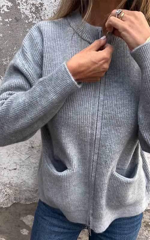 Elegant zwart vest met rits voor dames, veelzijdig te combineren voor zowel werk als vrije tijd.