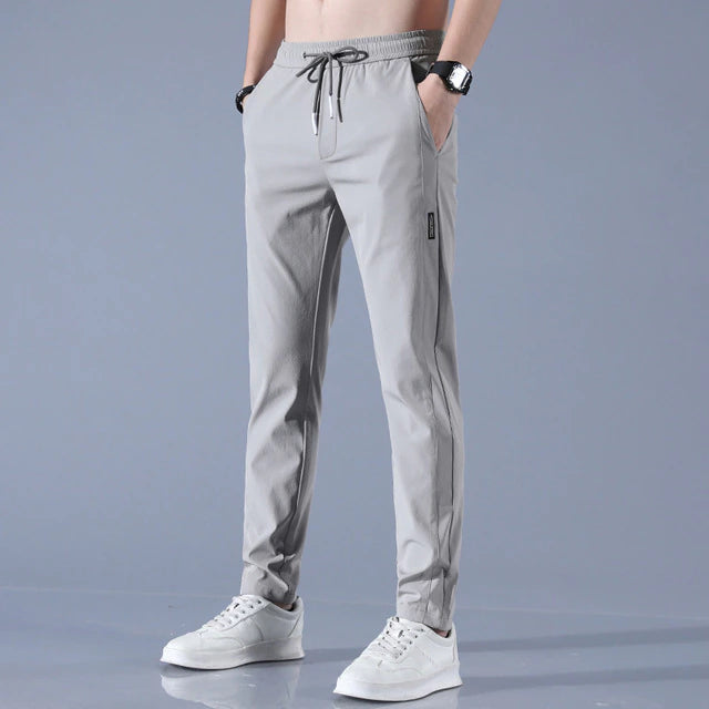 Veelzijdige heren broek, sneldrogend en comfortabel, perfect voor reizen, sport en dagelijkse activiteiten.