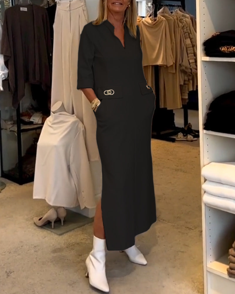 Elegante damesmode lange jurk met V-hals en moderne uitstraling
