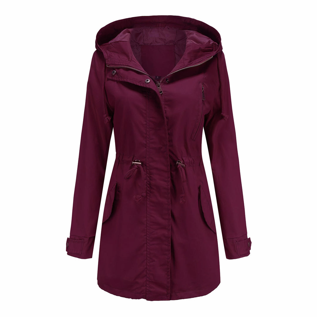 Elegante dames trenchcoat met ceintuur. Winddicht, perfecte lente/herfst buitenjas voor een moderne look.