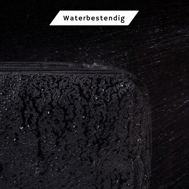 Waterafstotende zwarte toilettas met handvat handig in gebruik als reistas en cosmeticatas