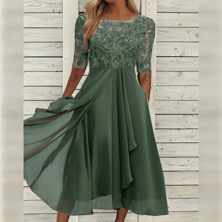 Stijlvolle dames jurk met kanten bodice in groene kleur