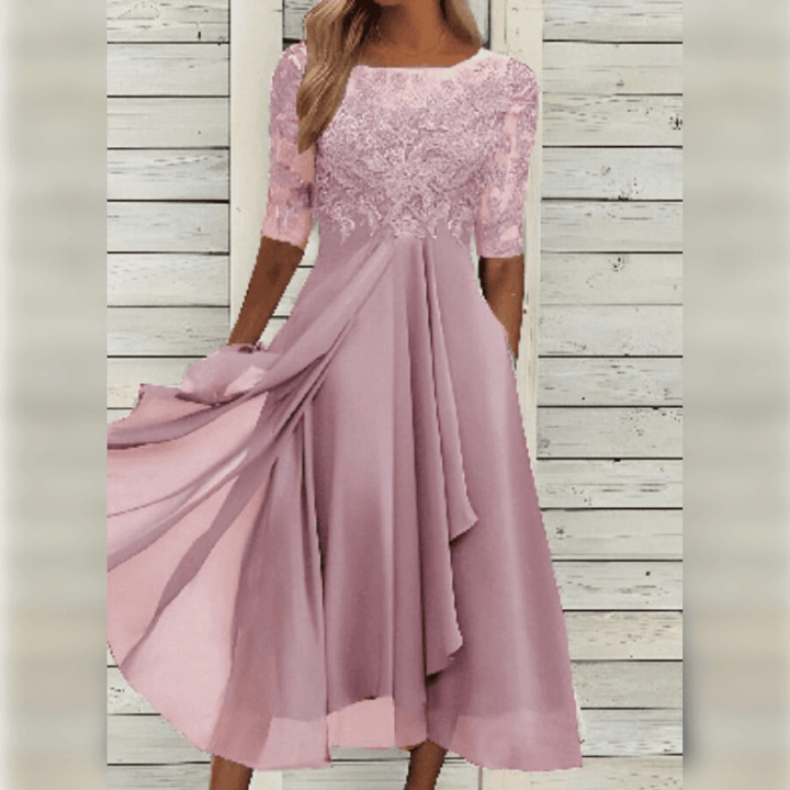 Roze elegante damesjurk met comfortabele pasvorm