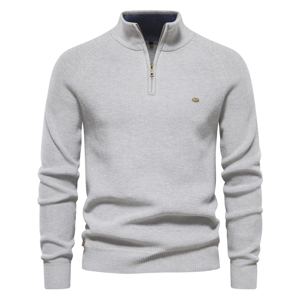Detail van de zachte, hoogwaardige stof van een luxe half zip trui voor heren. Ultiem comfort gegarandeerd.