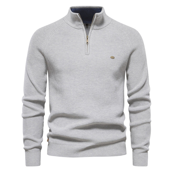 Detail van de zachte, hoogwaardige stof van een luxe half zip trui voor heren. Ultiem comfort gegarandeerd.