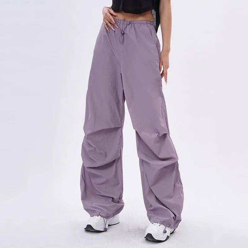Lila kleurige oversized parachute broek voor dames met verstelbare enkels