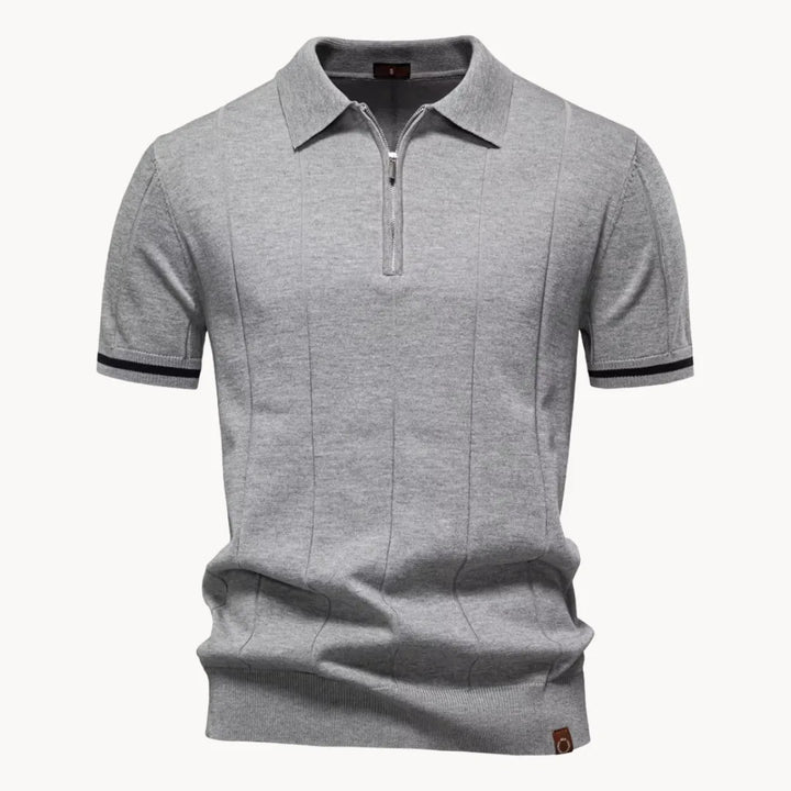 Trendy heren polo met korte rits; hoogwaardige gebreide stof en klassieke look.