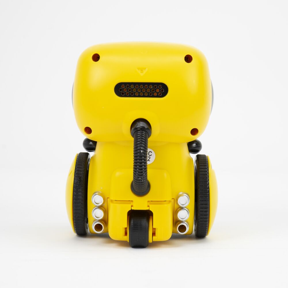 Achteraanzicht van de gele smart robot met luidspreker en wieltjes
