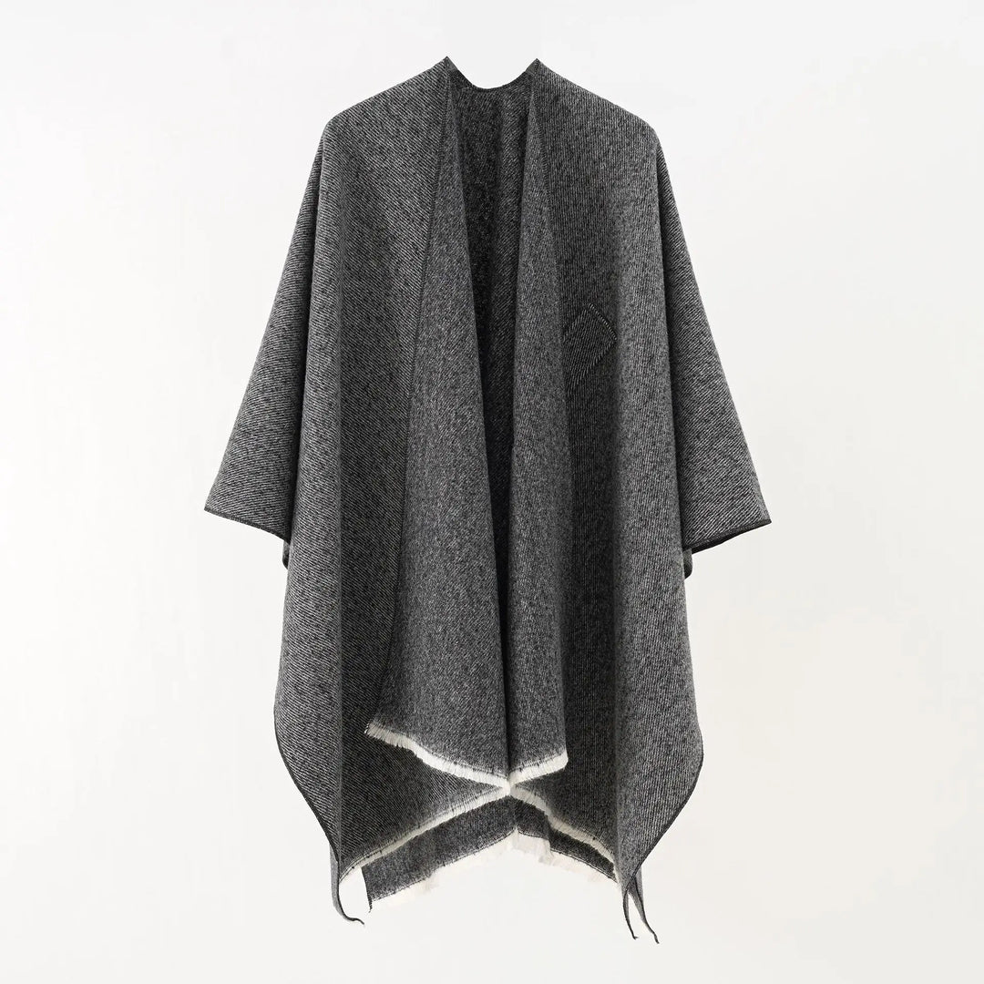 Effen kasjmierlook damesponcho, zacht en warm, een veelzijdig retro vest voor najaar en winter.