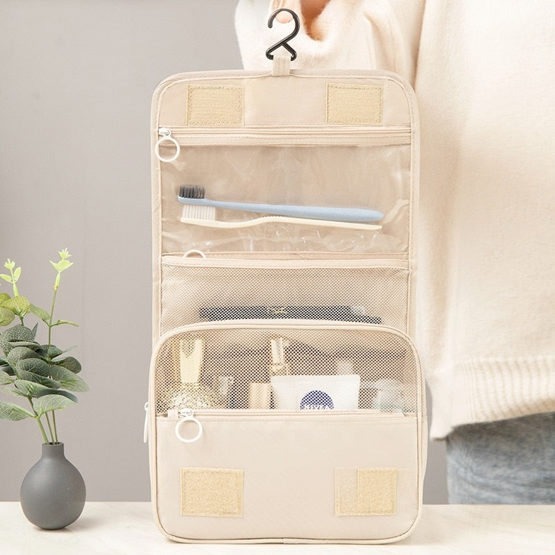 Open beige roll and go make-up tas met ophanghaak en vakken