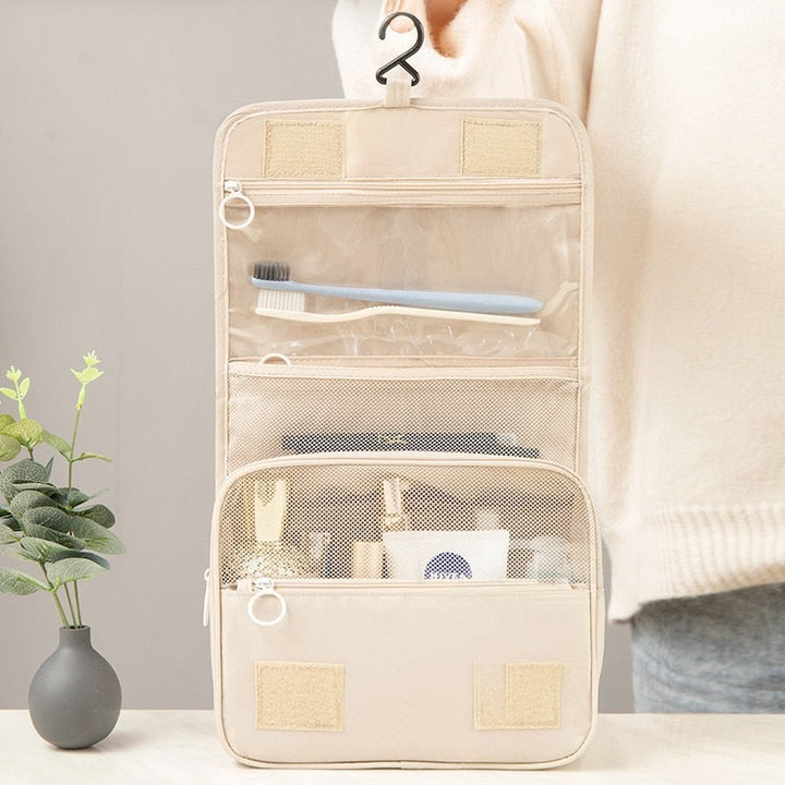 Open beige roll and go make-up tas met ophanghaak en vakken