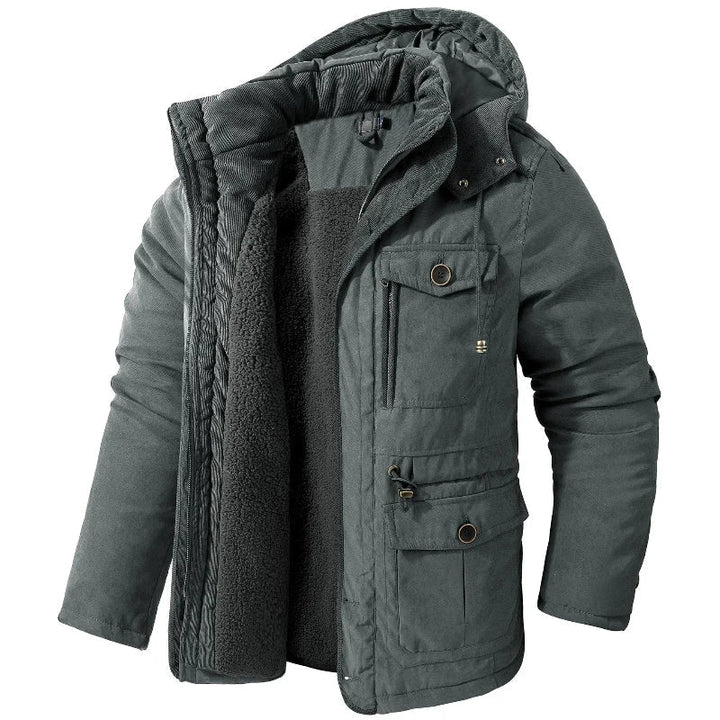 Stijlvolle waterdichte winterjas voor heren. Biedt optimale warmte en bescherming tijdens regen en koude weersomstandigheden.