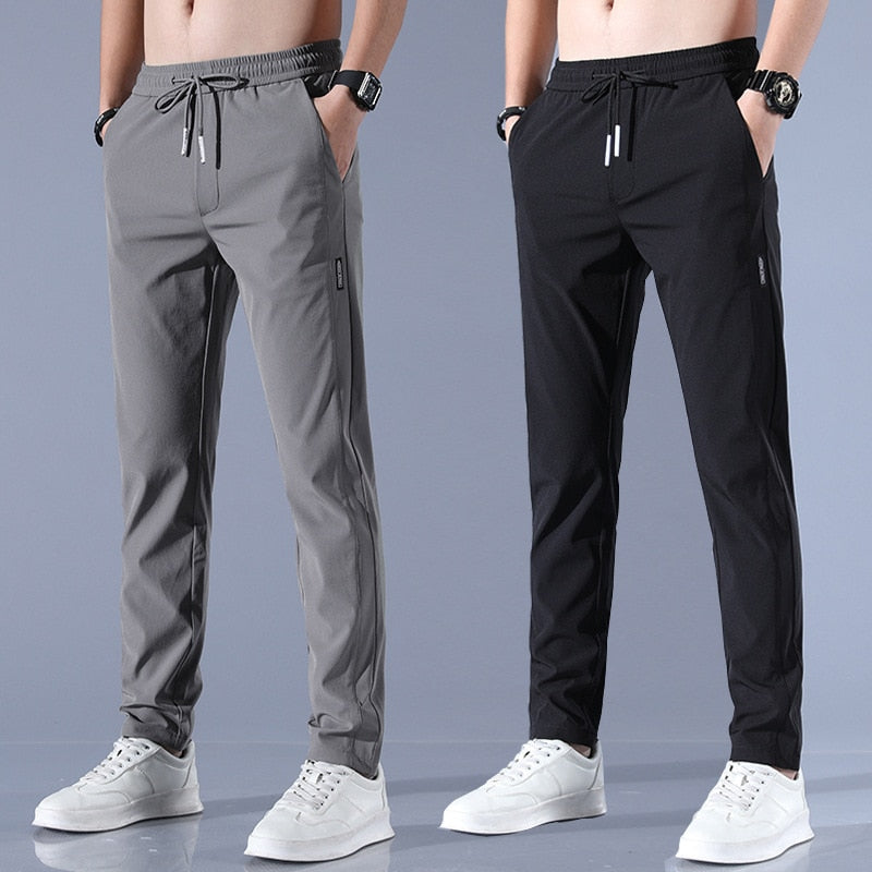 Heren sneldrogende stretchbroek, comfortabel en flexibel, perfect voor actieve kleding en sportieve mannen.